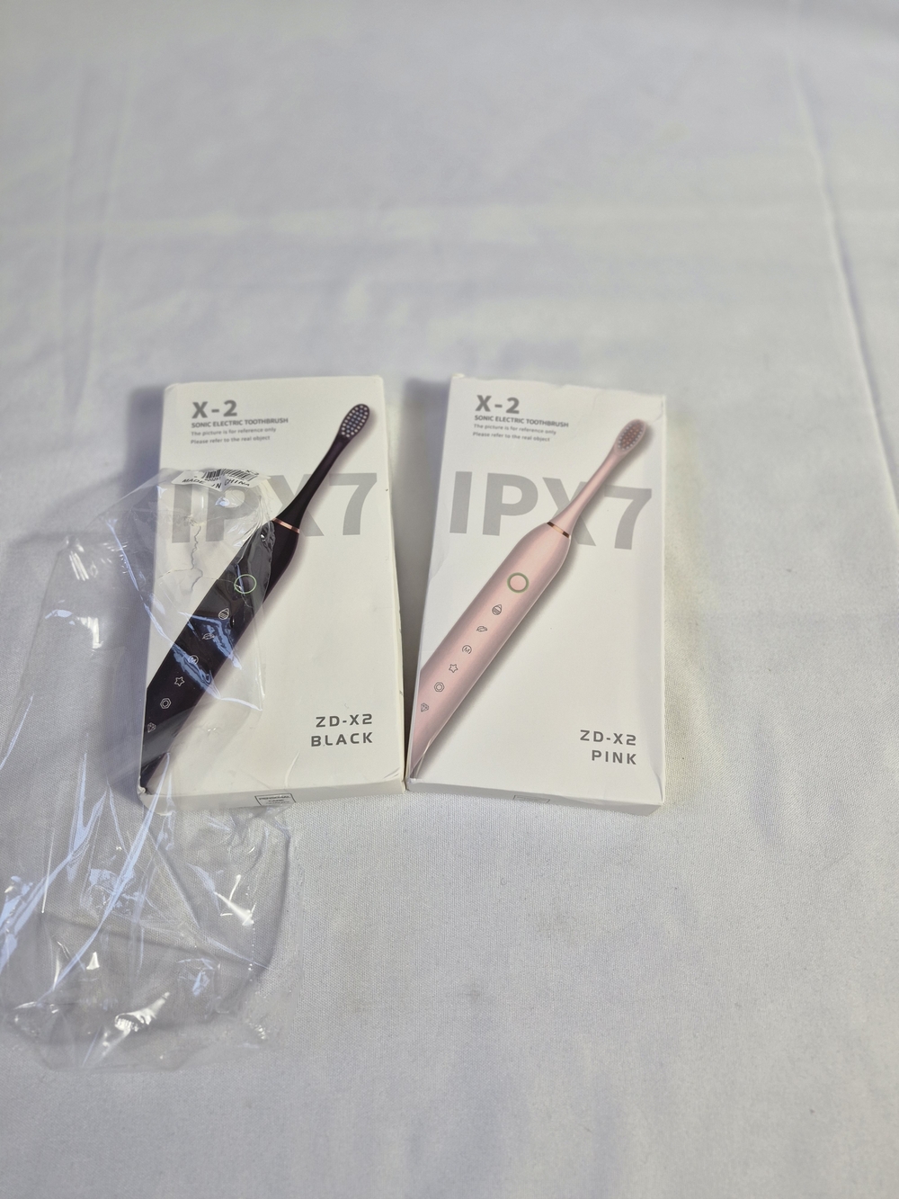 X-2 Electric Toothbrush Pair - Black & Pink Sealed